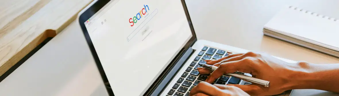 SEO Services: Person typing into google